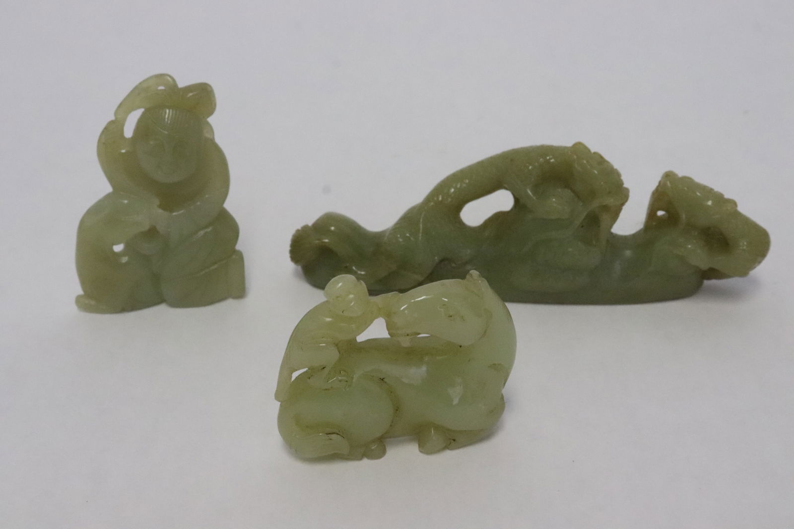 3 white jade carved ornaments: 3 white jade carved ornaments, 1.6"x1.85"x0.65" - 1.45"x4.2"x0.8"