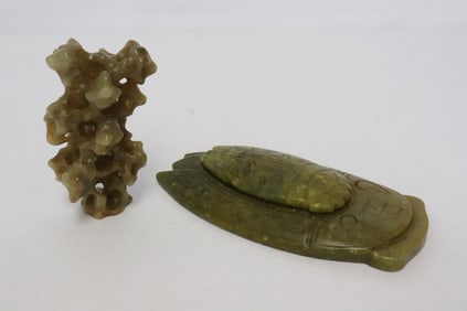 2 stone carved pieces