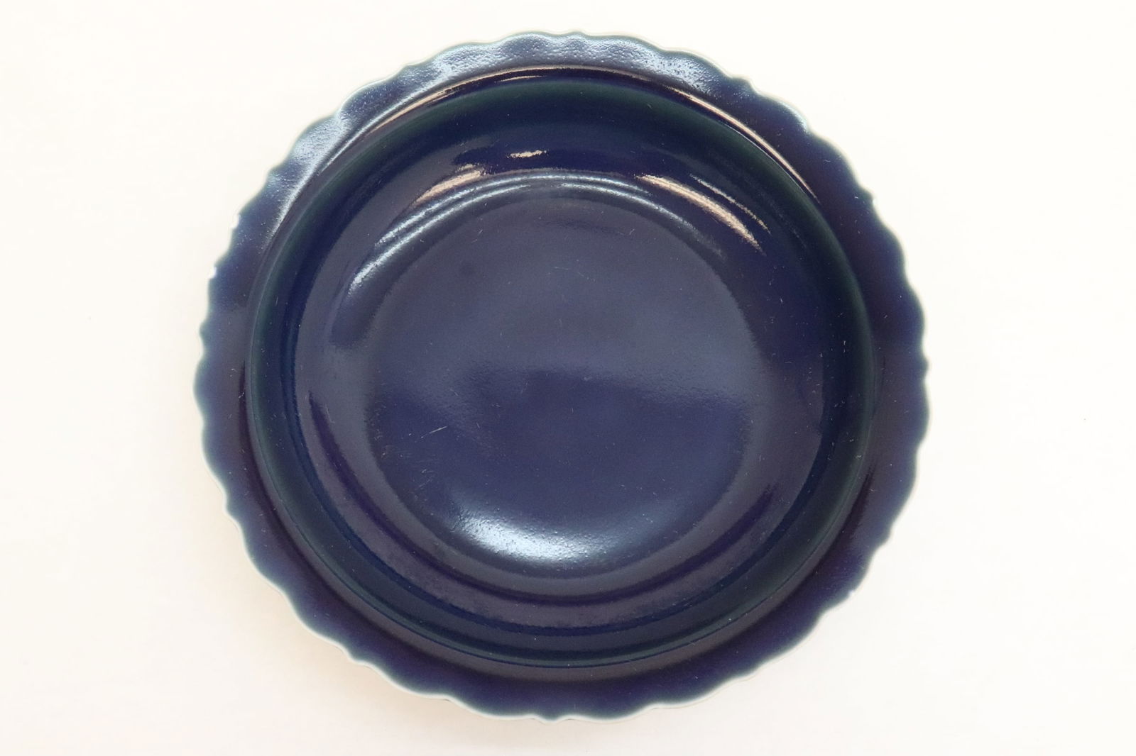 Chinese blue glazed porcelain plate: Chinese blue glazed porcelain plate with fluted edge, 1.85"x8.6"dia