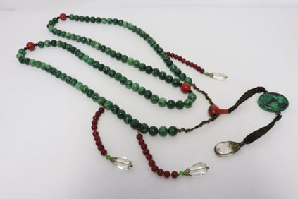 A long jade like bead necklace