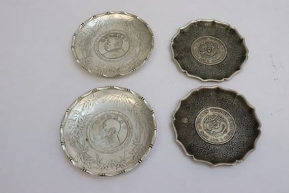 4 white bronze small dishes