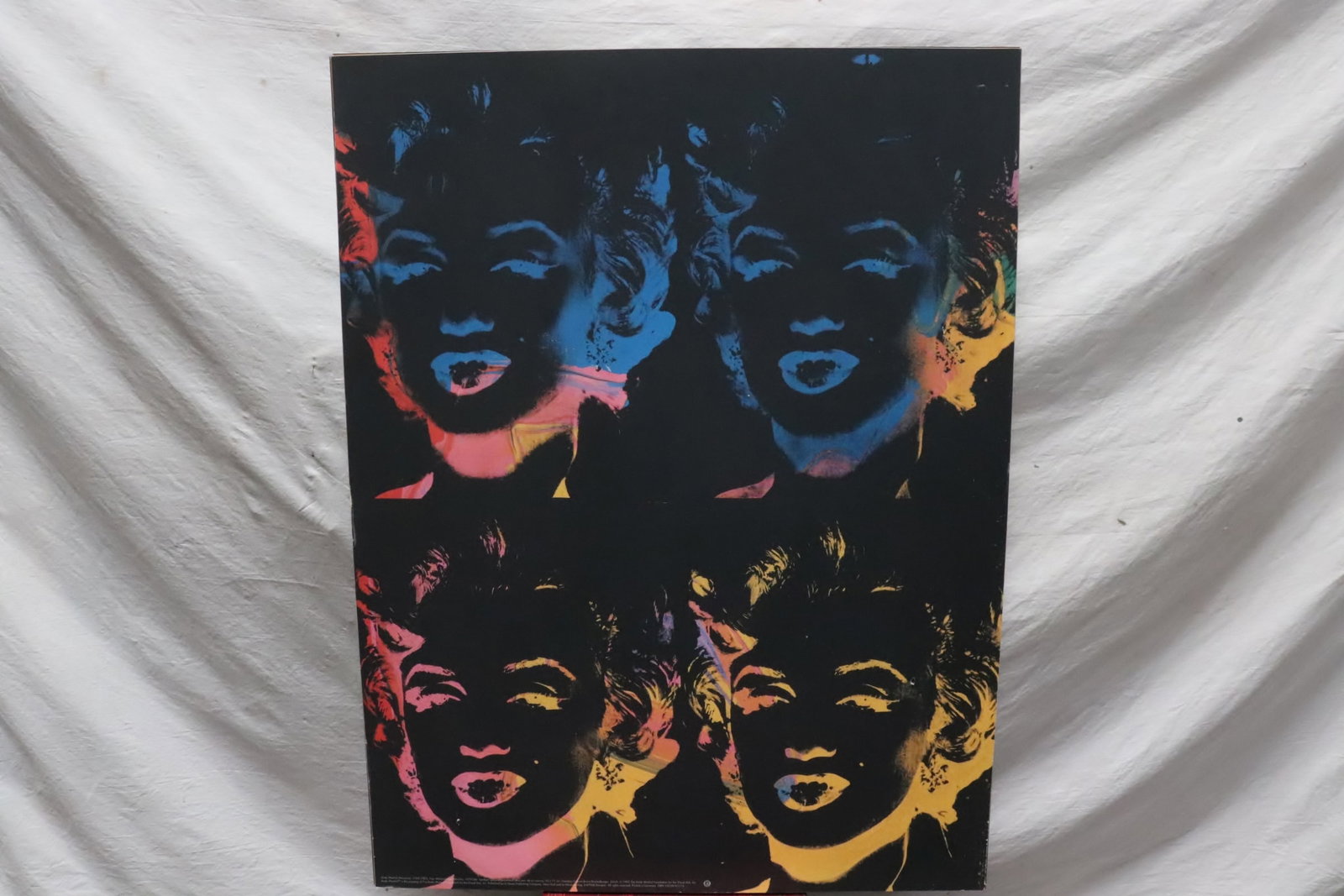 Andy Warhol, screenprint published by Le Neues co., c1993: Andy Warhol (New York, 1928-1987), "four multi-colored Marilyn", screenprint in color published by Le Neues co., c1993, 31.4"x24"x1.6"