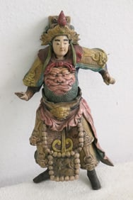 Antique roof tile in the form of warrior
