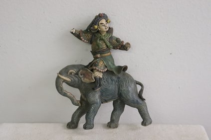 Antique roof tile depicting warrior on elephant