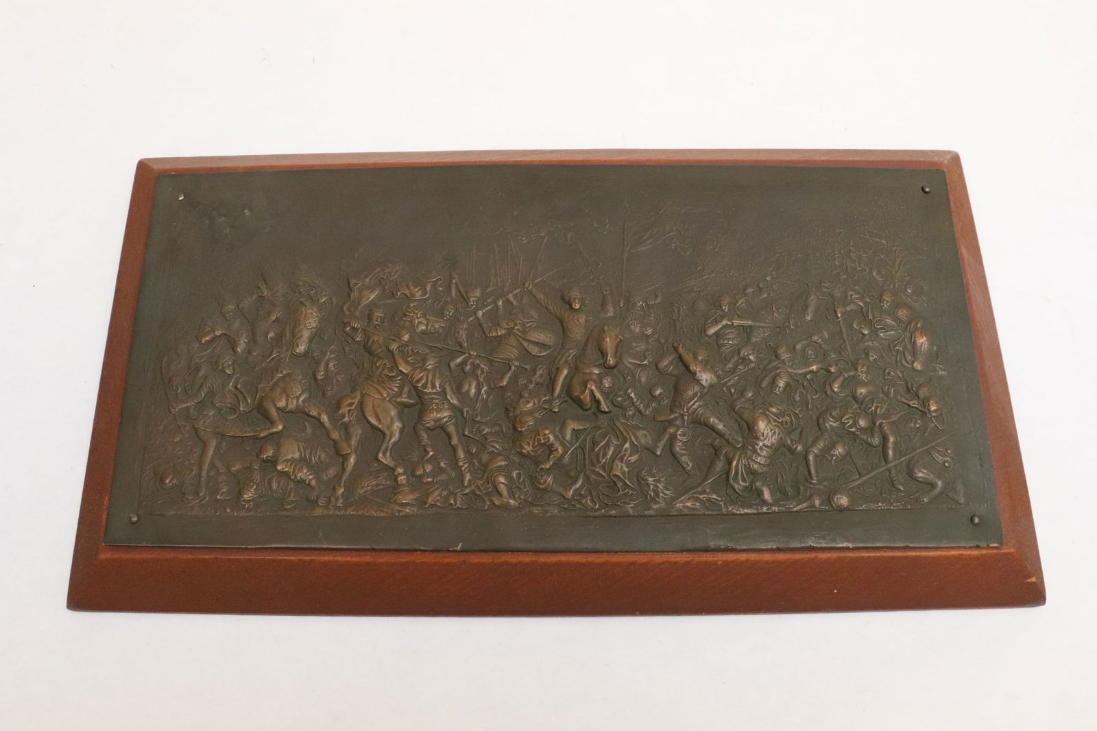 An European copper relief panel: An European copper relief panel depicting middle age war scene a very detailed and beautiful example, 6.85"x12.65"x1.2"