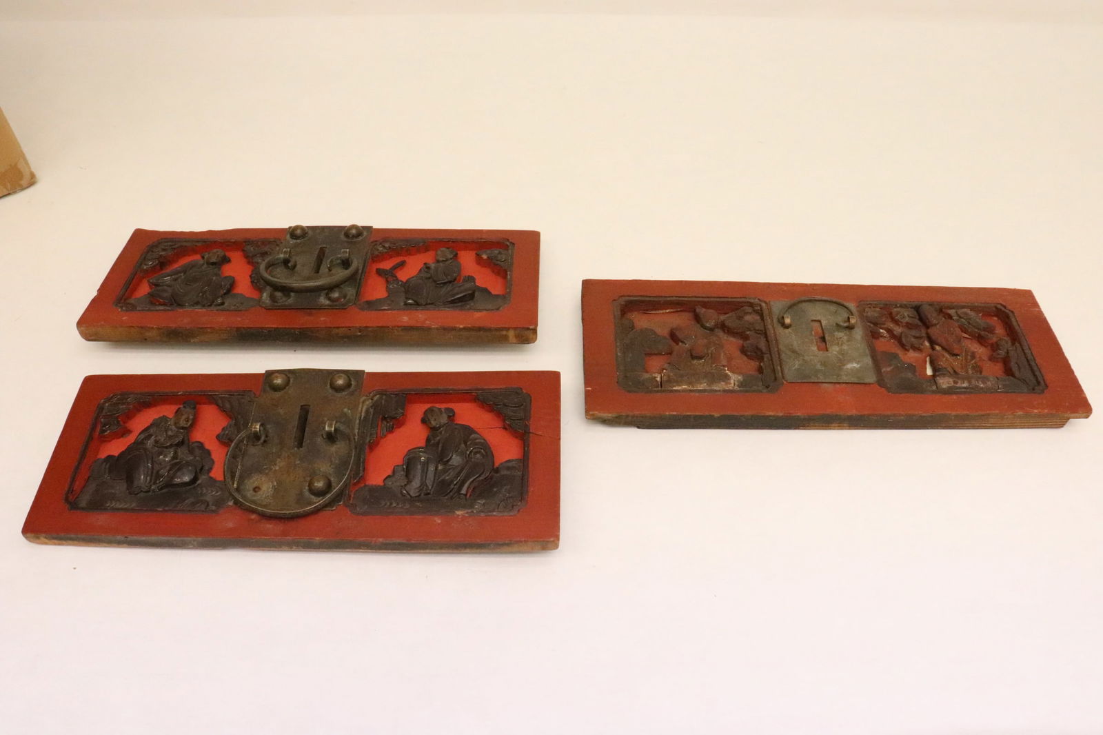 3 Chinese antique wood drawer front panels: 3 Chinese antique painted and carved wood drawer front panels with cast bronze/ brass pulls, 4.6"x11.85"x1.5" - 4.4"x12.5"x1.3"