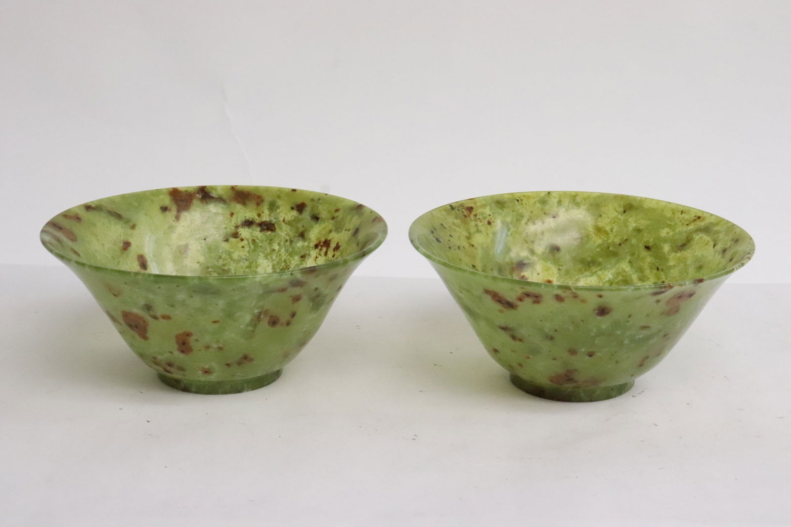2 green jade carved bowls: 2 green jade carved bowls, 2.2"x4.75"dia ea
