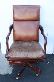 Leather armchair with wheels
