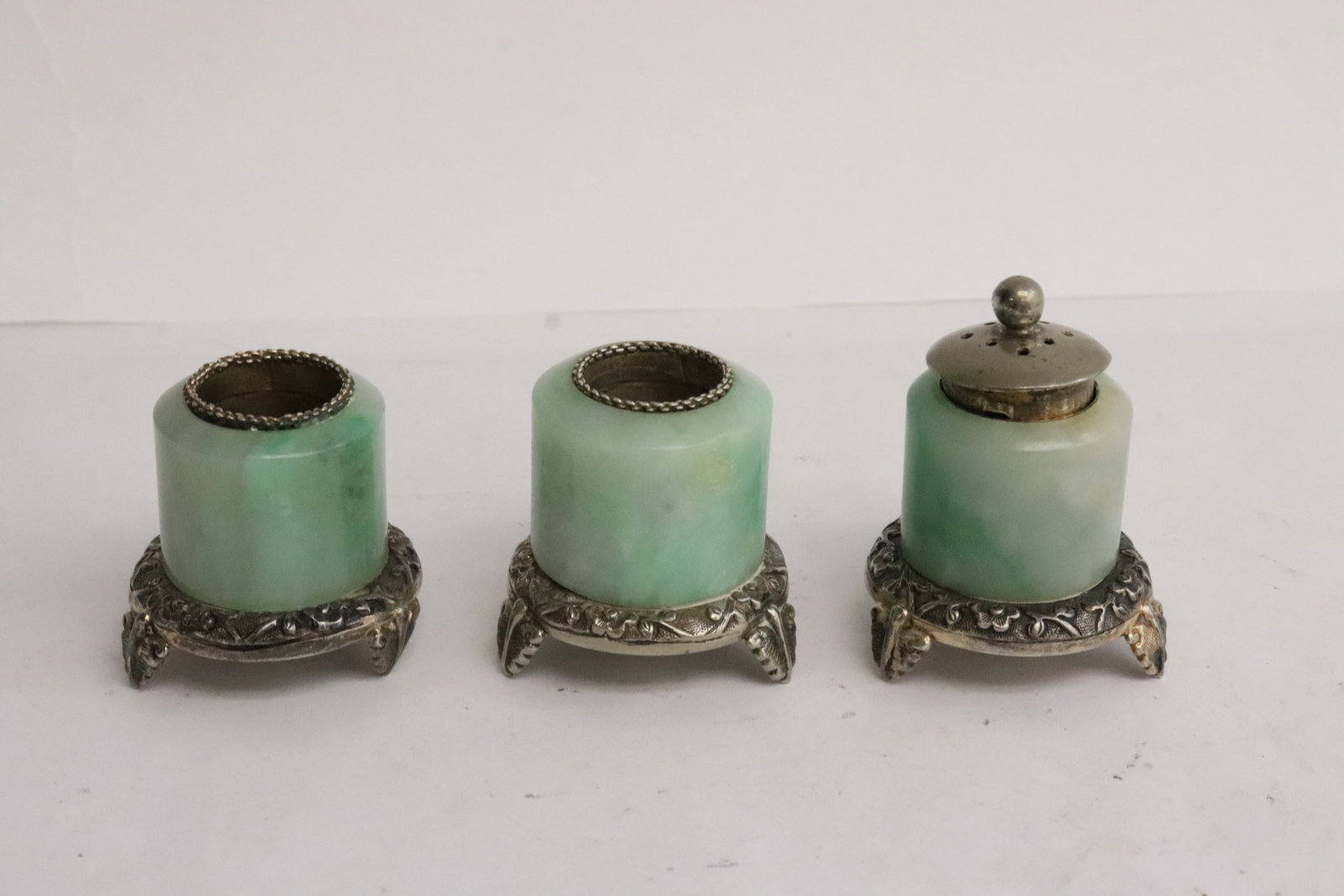 3 antique jadeite archer's ring w/ silver mount, make as shakers: 3 Chinese antique jadeite archer's ring with silver mount to make as pepper and salt shakers, 1.65"x1.7"dia - 2.15"x1.75"dia