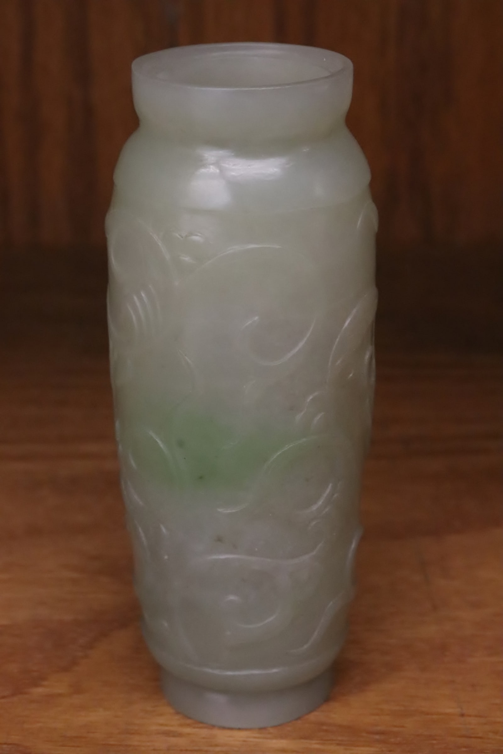 Chinese jadeite carved small vase: Chinese jadeite carved small vase with floral motif decoration in relief, 4"x1.6"dia