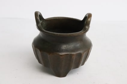 A vintage Chinese bronze handled censer