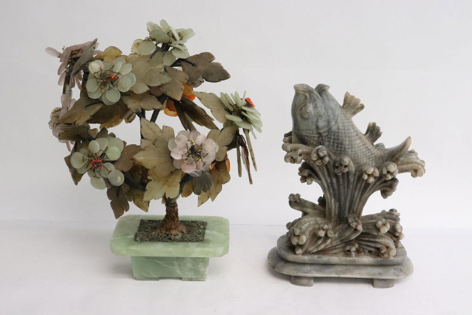 a shoushan stone carving, and a jade tree: 2 pieces; a shoushan stone carving depicting jumping fish (9"x7"x3.3"), and a jade tree (11.6"H)