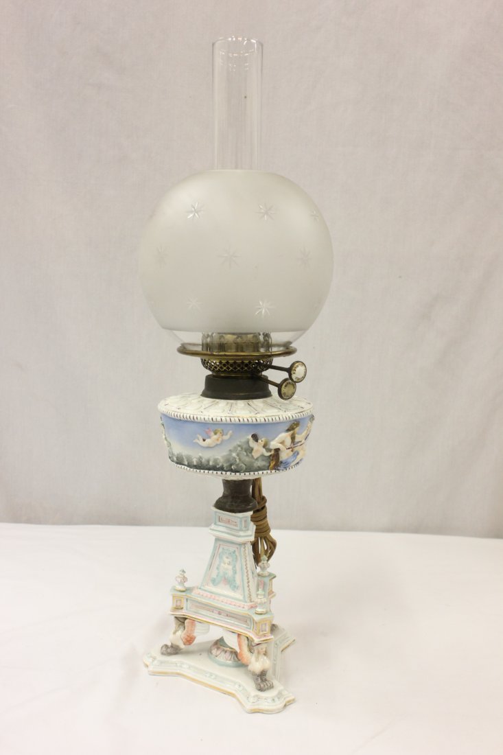 Germany antique porcelain oil lamp, electrified: A fine Germany antique porcelain oil lamp, electrified, 24.9"Hx7.5"dia