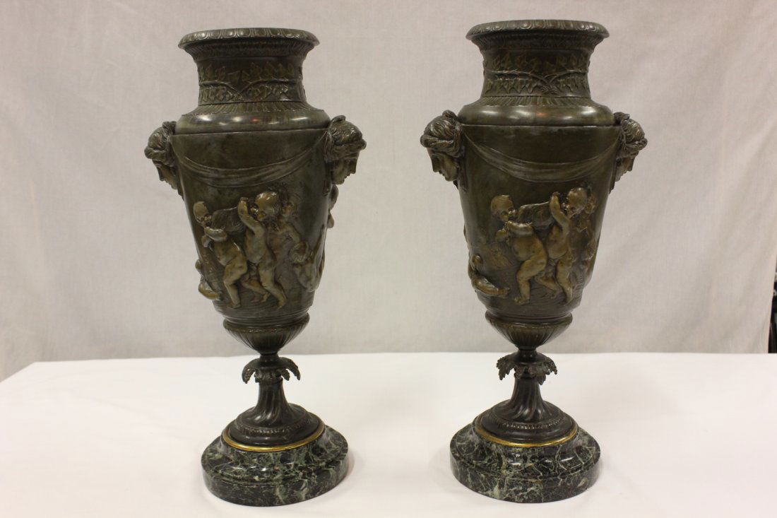 Pr Italian antique spelter vases: Pair Italian antique spelter vases with cherub scene in relief, with marble base, 17"Hx8.3"x6" each