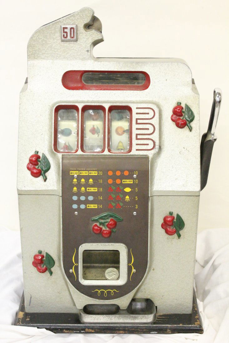 Mills 50-cents Black Cherry slot machine c1946: Important Mills 50-cents Black Cherry model slot machine (or called Fish Mouth model), c1946, with original finish. 26.5"Hx17"x15"