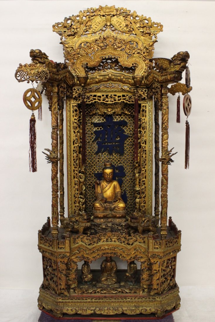Magnificent Chinese antique temple shrine: Magnificent Chinese antique temple shrine. The main level resting a fine gilt wood Daoism god accented by 2 gilt wood fulion motif candle holders, surrounded by 8 Daoism god. The bottom level consisti