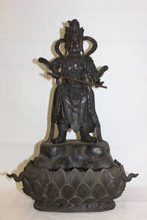 Chinese antique bronze sculpture of Buddha: An important Chinese antique bronze sculpture of Buddha with sword, with original bronze base, 16"Hx11"x7.25"