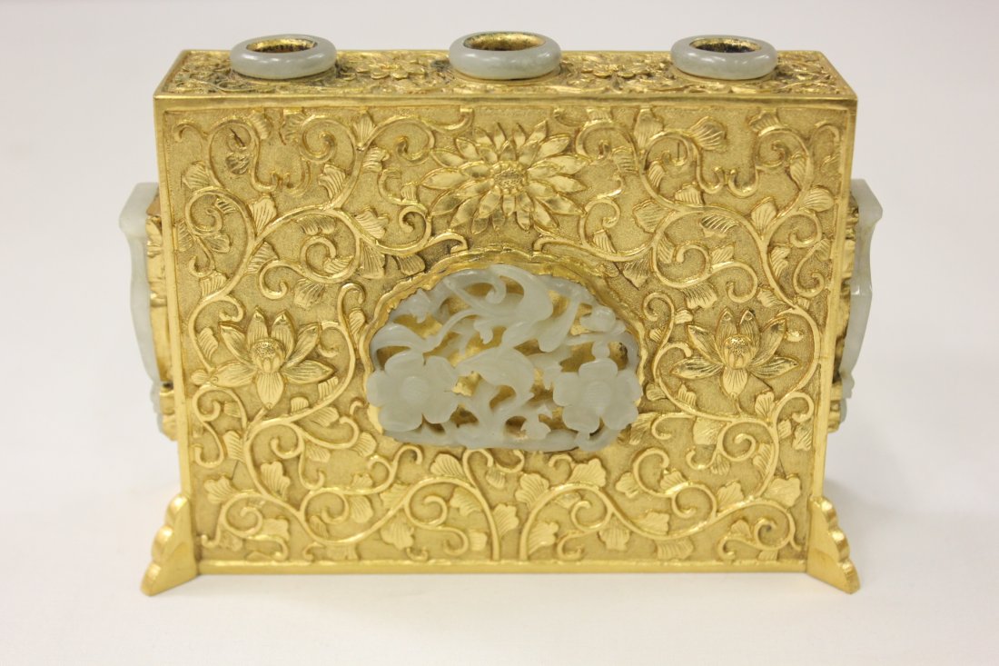 Chinese antique gilt bronze pen holder w/white jade: Chinese antique gilt bronze pen holder, accented by 4 white jade carved plaques, the plaques carved in children, floral and urn motif, top decorated with 3 white jade rings, 3.6"Hx5"x1.8"