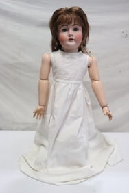 A massive antique German bisque head doll