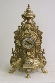 A large fancy brass cased keywind clock