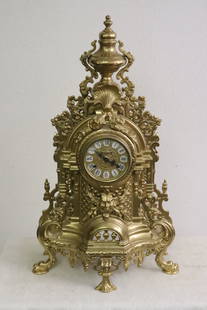 A large fancy brass cased keywind clock: A large fancy brass cased keywind clock, 24.2"x14.5"x6.7"