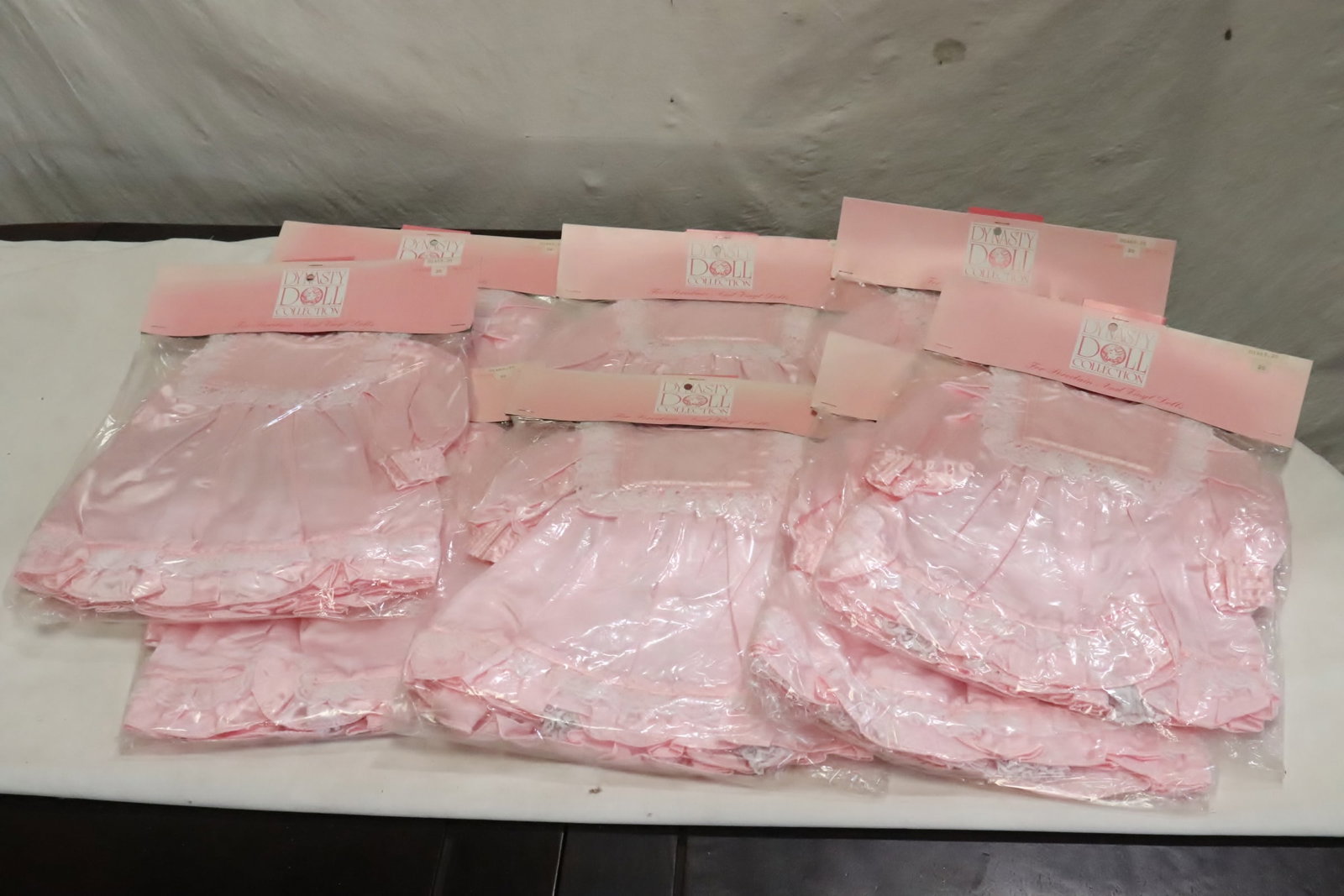 8 new doll cloth in original package: 8 new doll cloth in original package