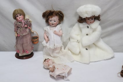 4 German antique bisque head dolls