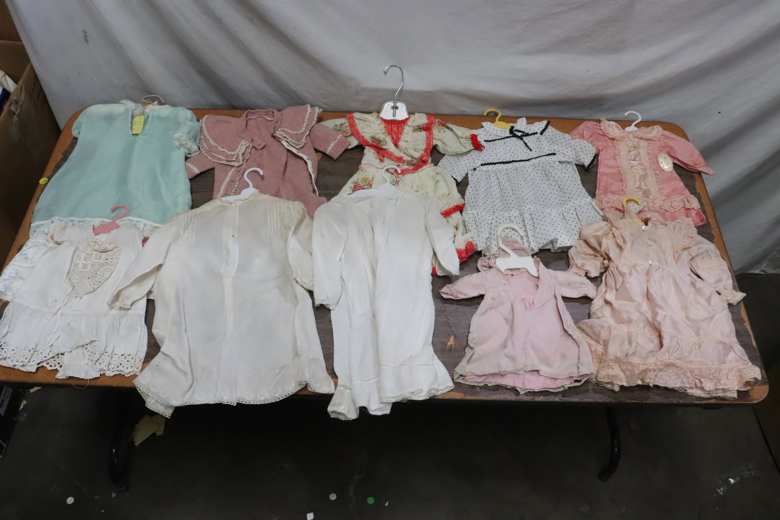 Lot of vintage doll dresses: Lot of vintage doll dresses