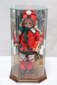 A Lenci doll with display case