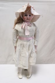 A massive Simon Halbig bisque head doll
