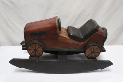 A fancy baby wood rocker