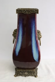 Chinese blue on red porcelain vase w/ bronze mount