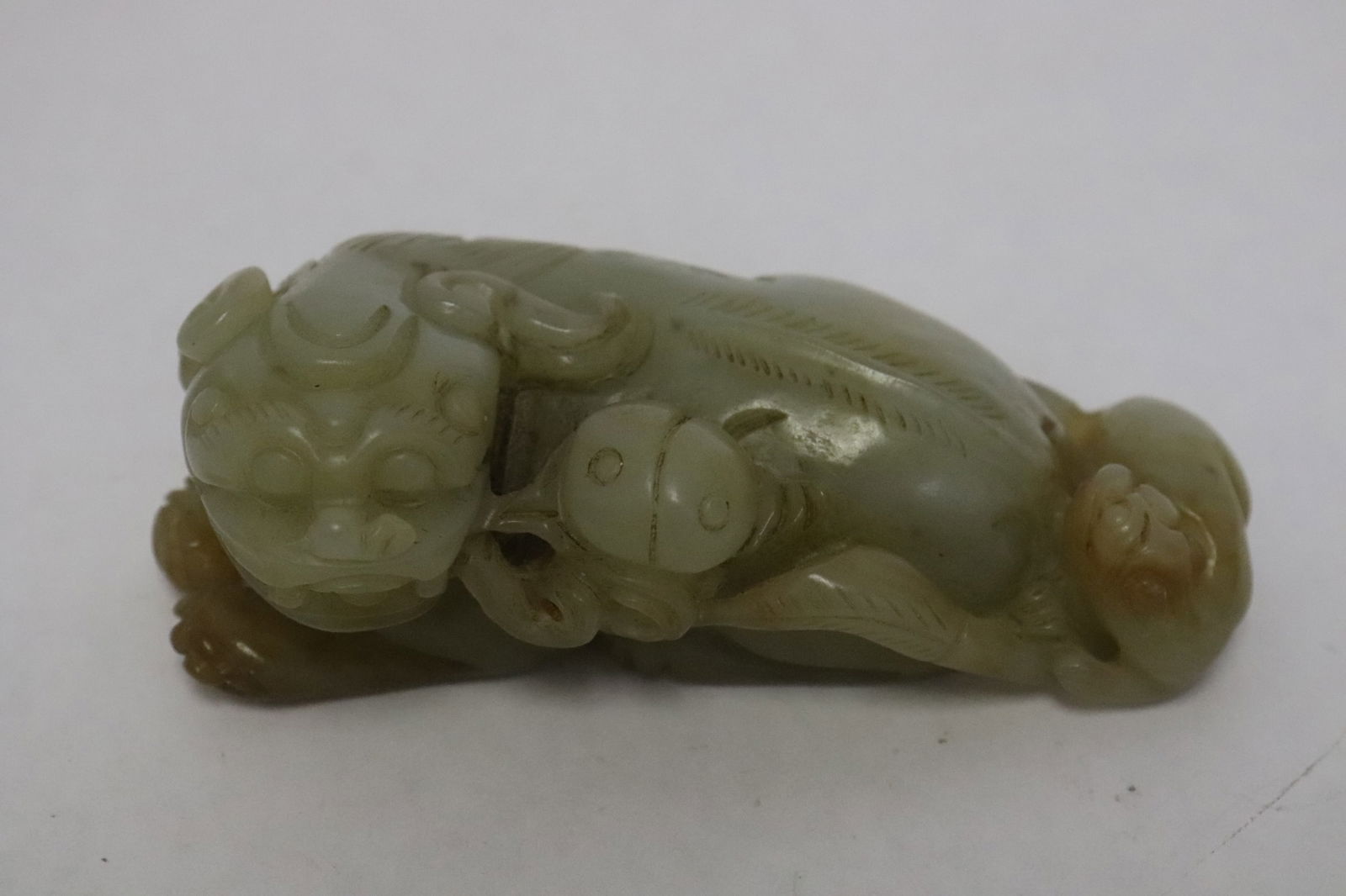 Chinese white jade carved qilin: Chinese white jade carved qilin, 1.5"x3.9"x2.2"