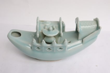 A celadon porcelain sculpture