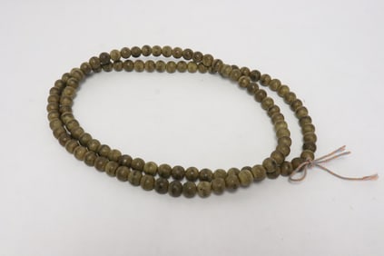 A long wood bead necklace