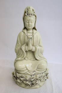 A blanc de shin porcelain sculpture of Guanyin: A blanc de shin porcelain sculpture of Guanyin, 10.3"H