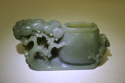 A celadon jade carved vase