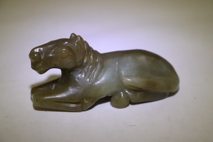 A celadon jade carved horse