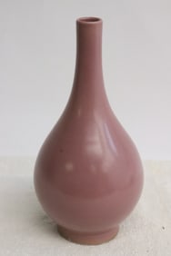 A purple glazed porcelain vase