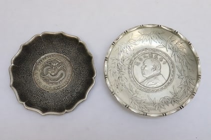 2 white bronze dishes
