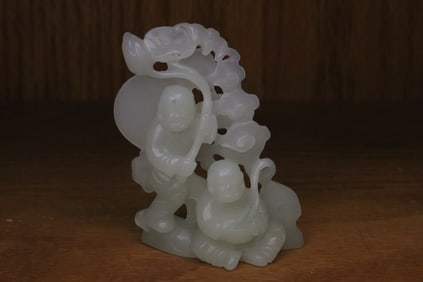A white Peking glass carved ornament