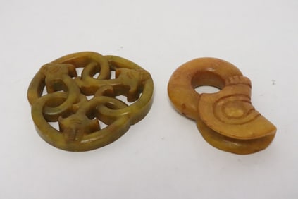 2 jade like stone carved ornaments
