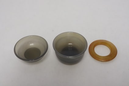 3 agate like items; 2 cups, and a disc
