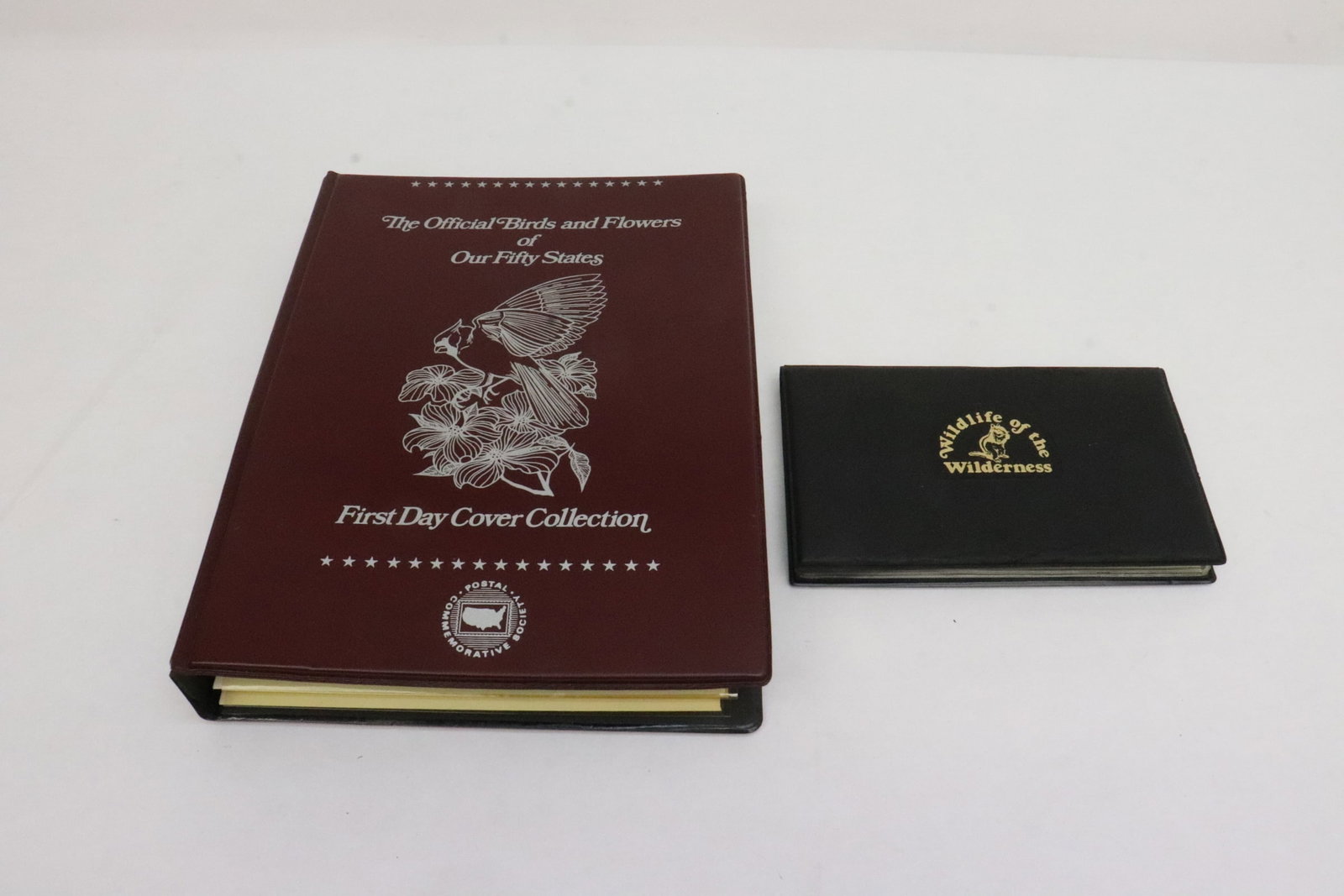 2 First Day issue albums: 2 First Day issue albums; "the official birds and flowers of our fifty state", and "wildlife of the wilderness"