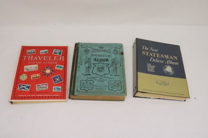 3 partial stamp albums