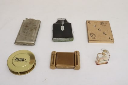 Lot of compact, and a Chanel No. 5 perfume