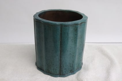 A blue glazed Yixing clay brush holder