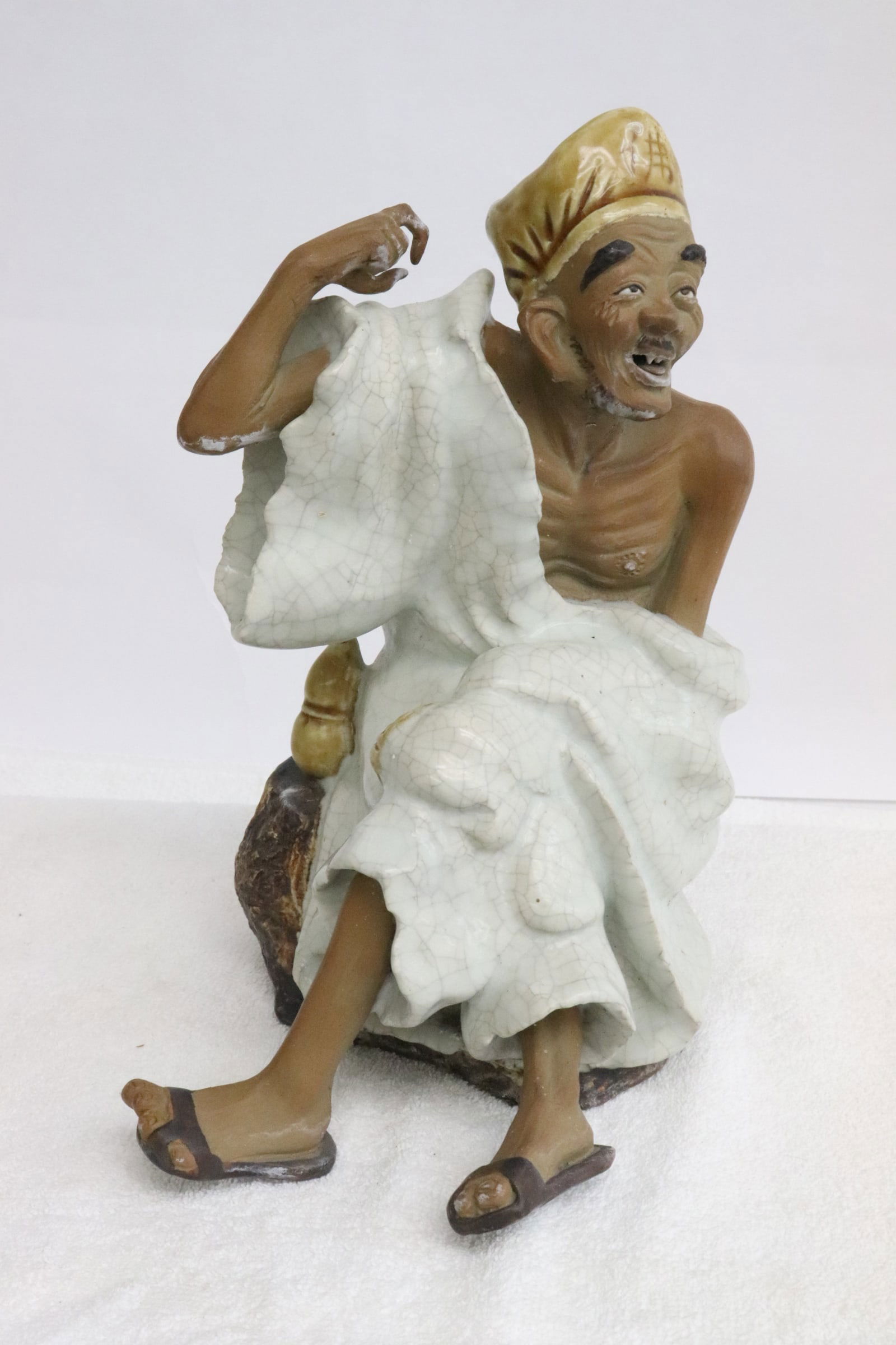 Chinese earthenware sculpture of deity: Chinese earthenware sculpture of deity, 9.8"H