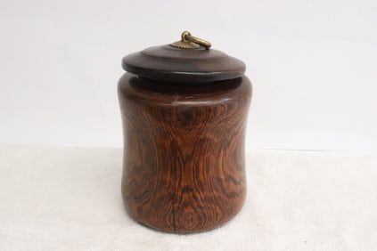 A rosewood tea caddy