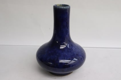 A blue glazed porcelain vase